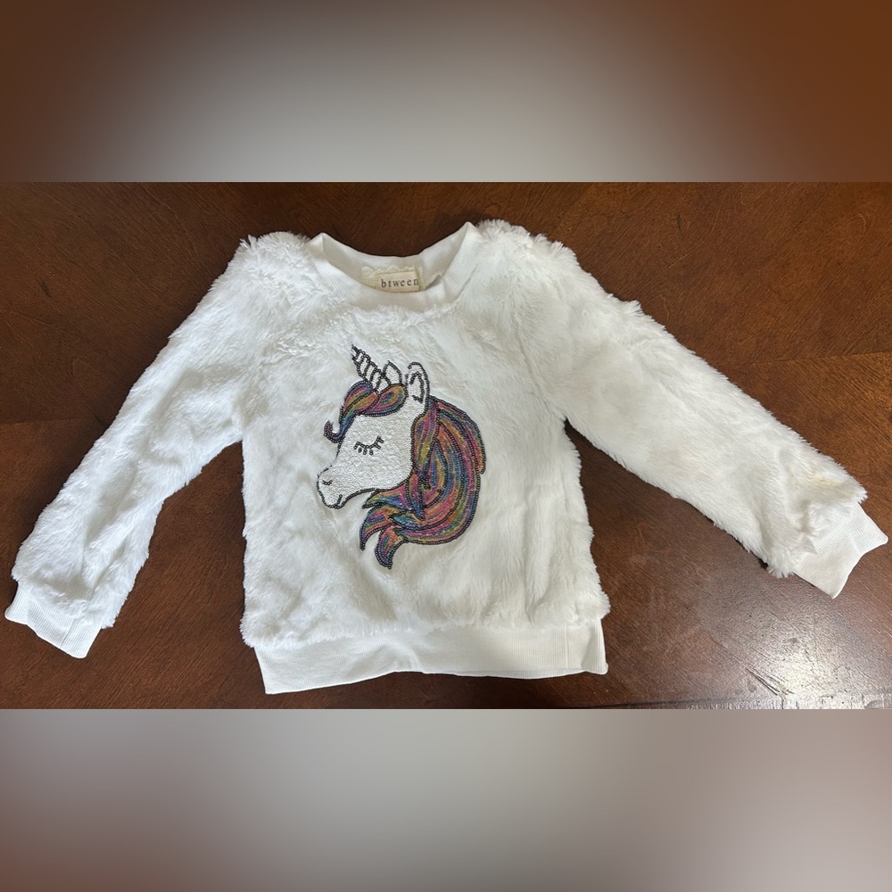 Between girl furry top size 4 color white with sparkling unicorn